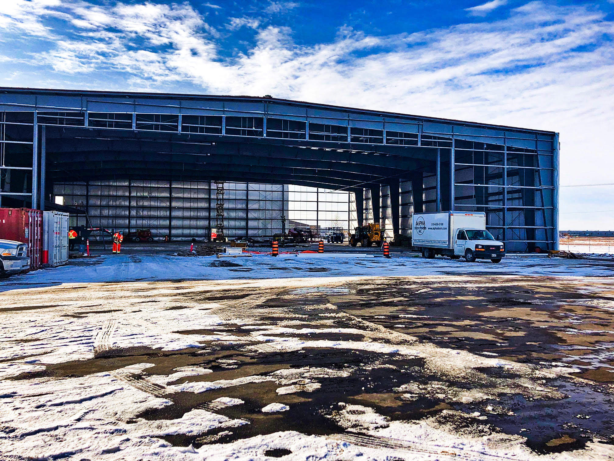 Construction of a hangar in the winter with snow