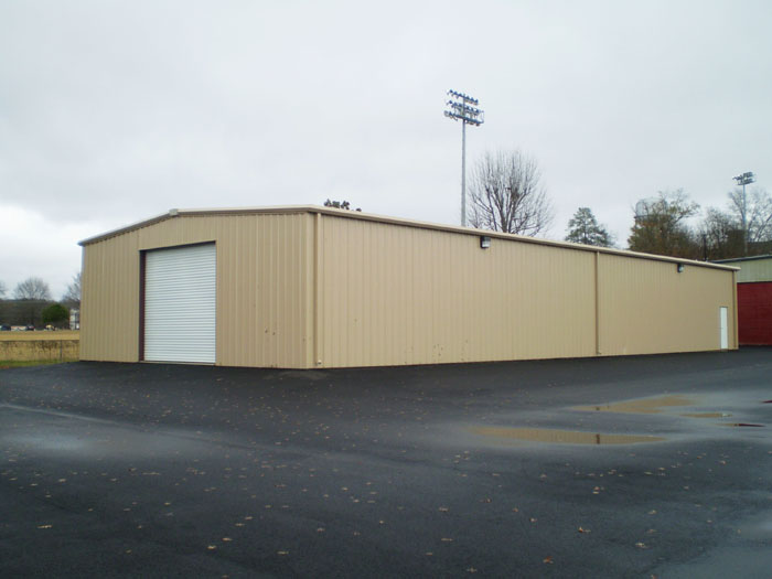 Commercial building exterior with beige metal panels